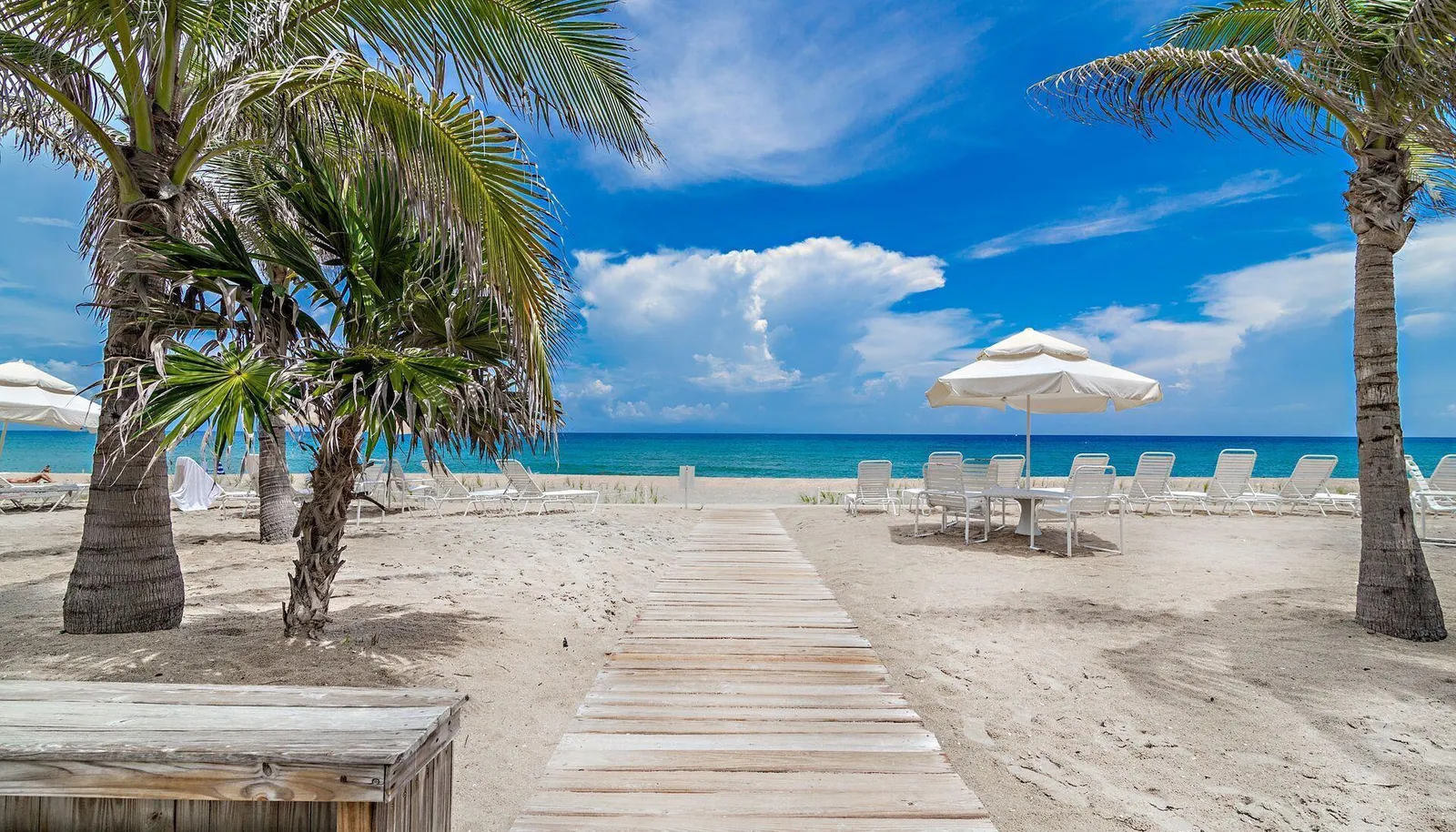 Private Beach with Chairs and Umbrellas